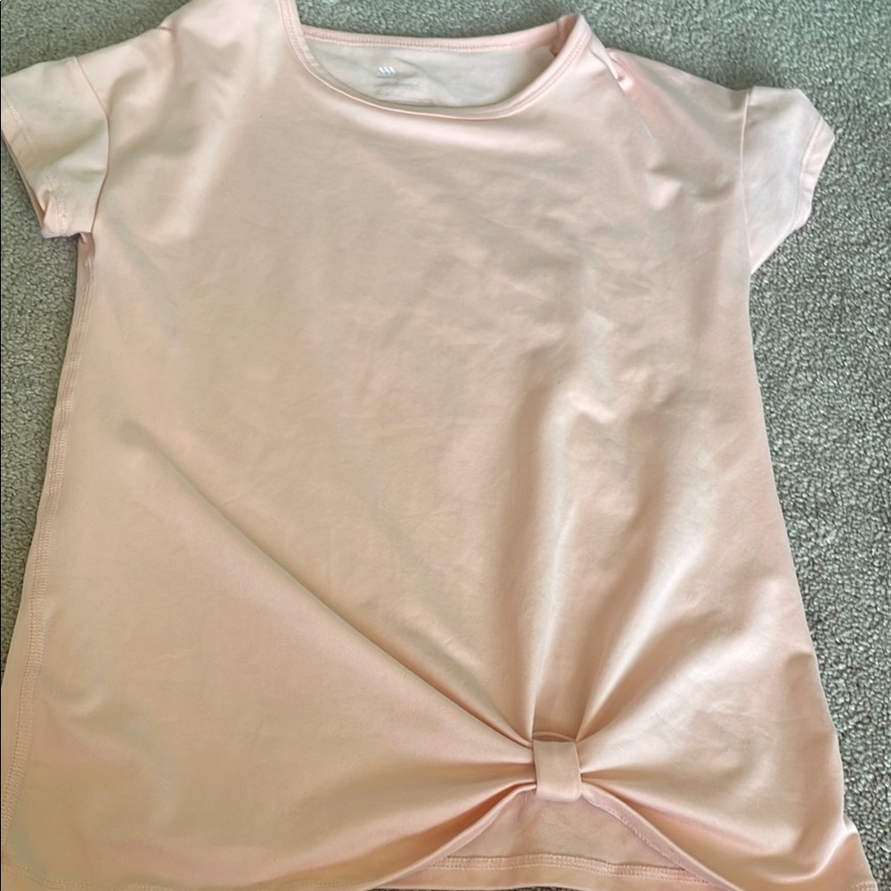 Girls all in motion athletic light orange shirt